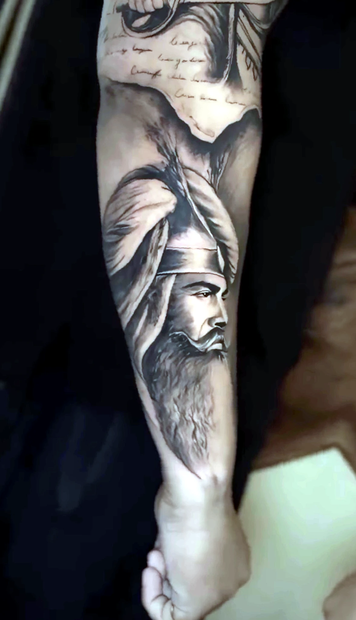 Black and grey realism Sikh warrior profile by Rav Singh at Inkology