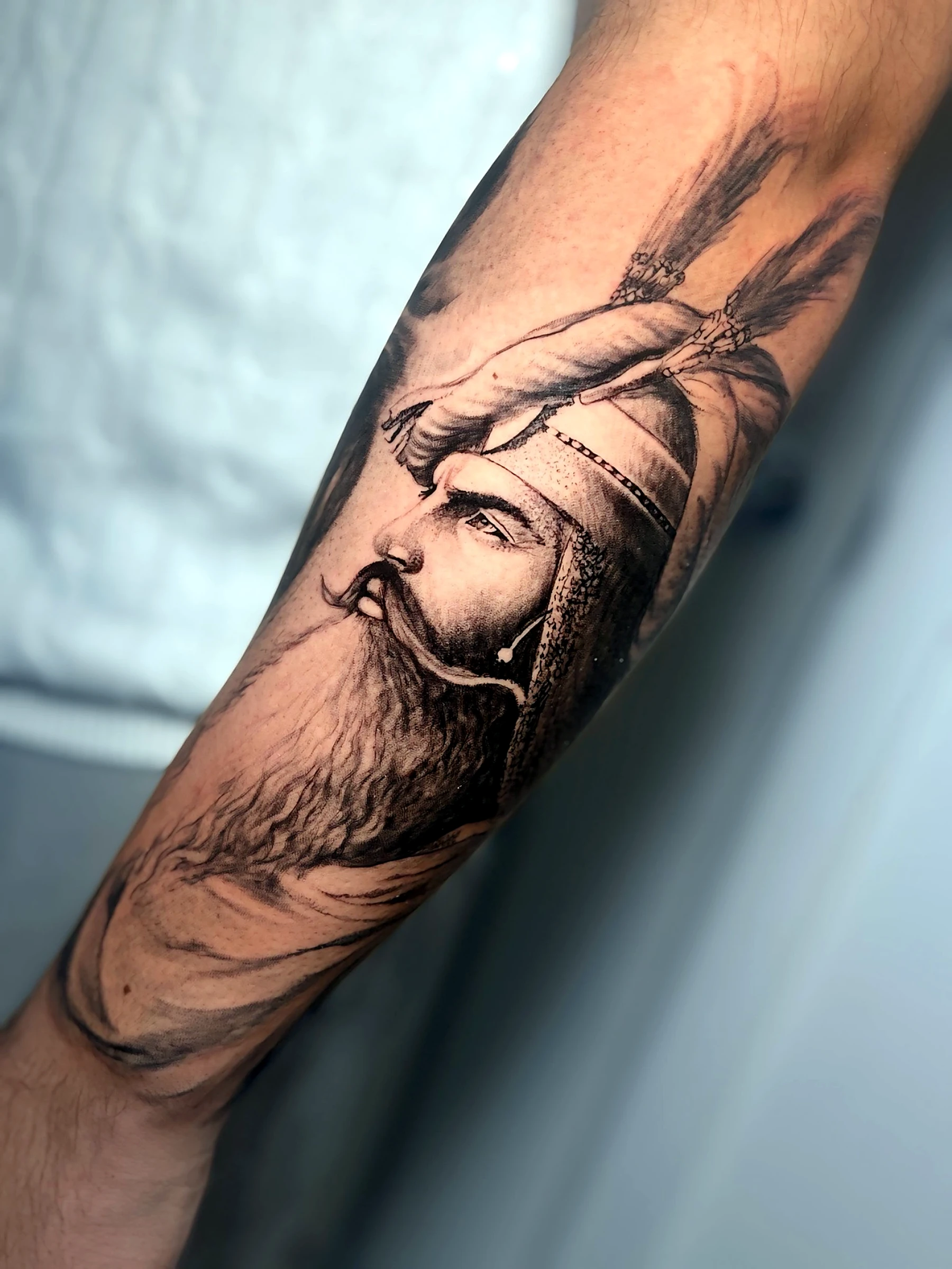 Black and grey realism Sikh warrior profile detail by Rav Singh at Inkology