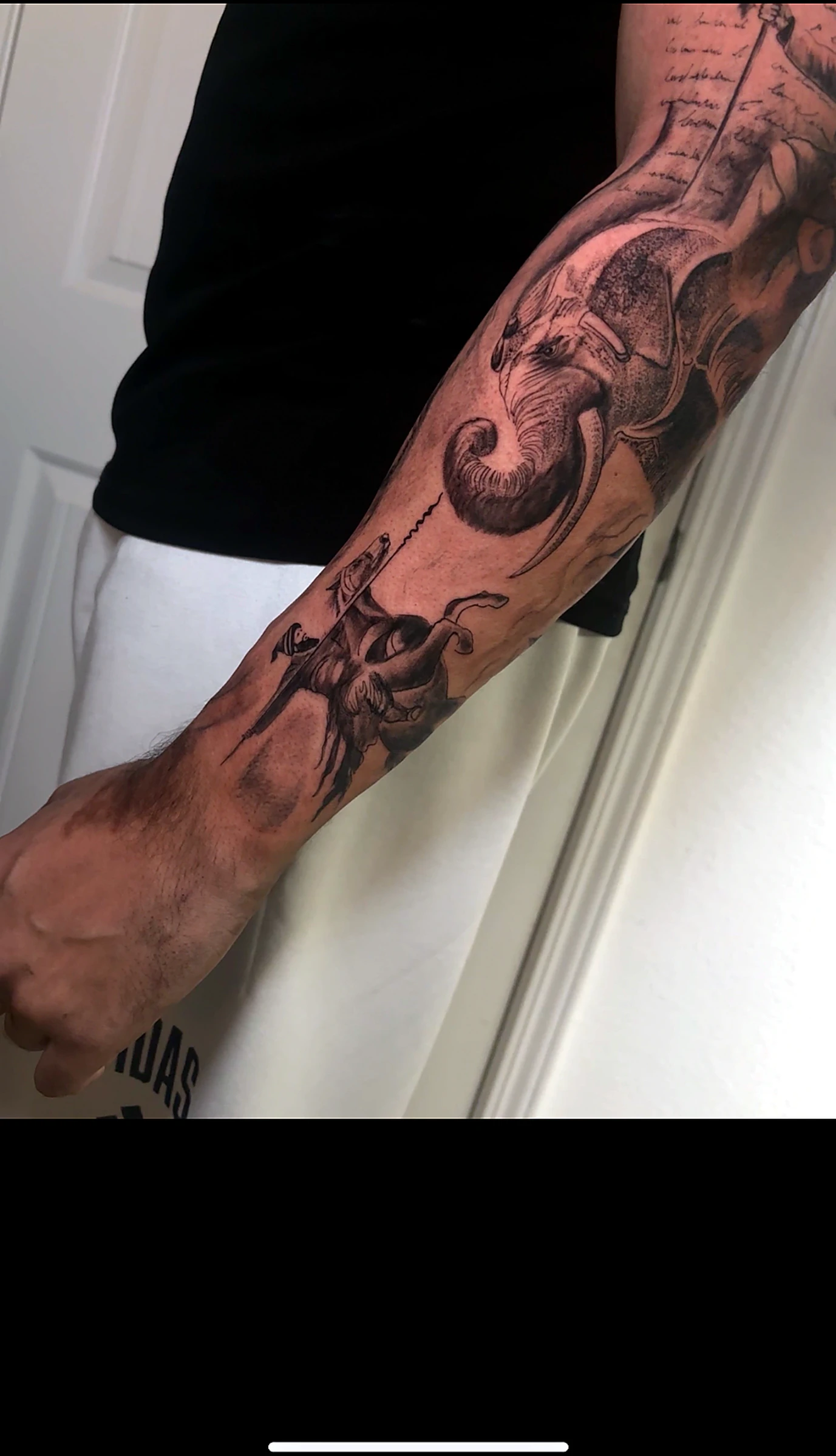 Black and grey realism elephant battle scene by Rav Singh at Inkology