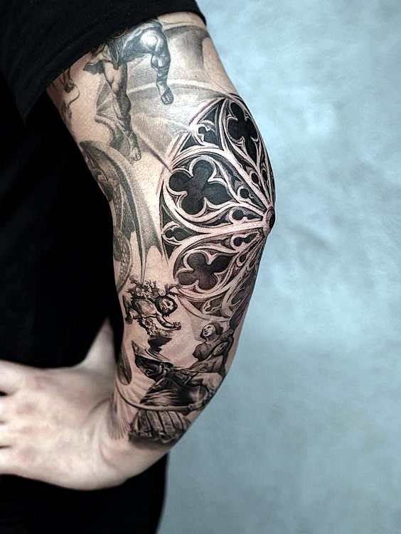 Ornamental elbow tattoo by Rav Singh at Inkology